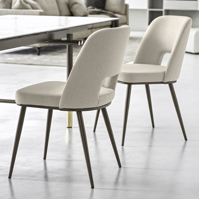 Foyer dining chair with perforated backrest