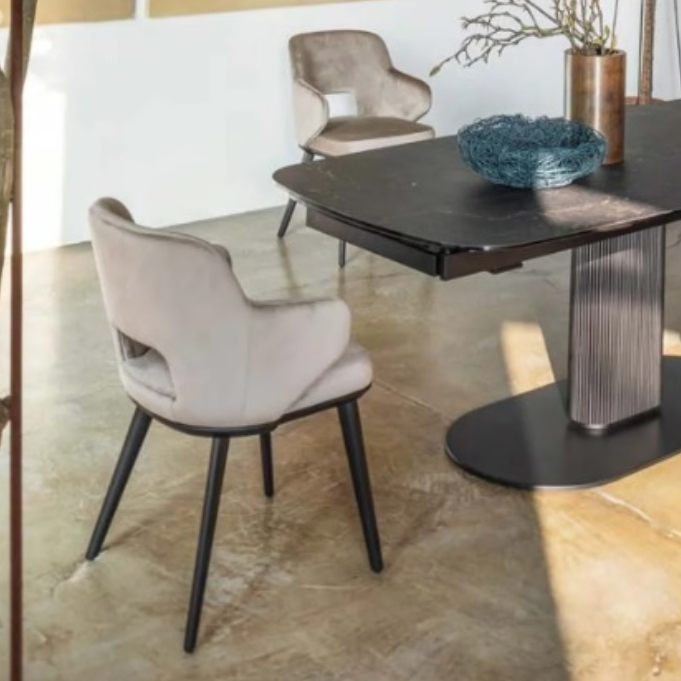 Foyer dining armchair with perforated backrest